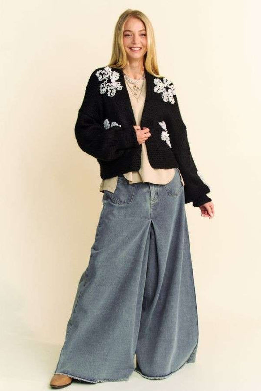 Front full-length view of Davi & Dani black floral appliqué cropped cardigan