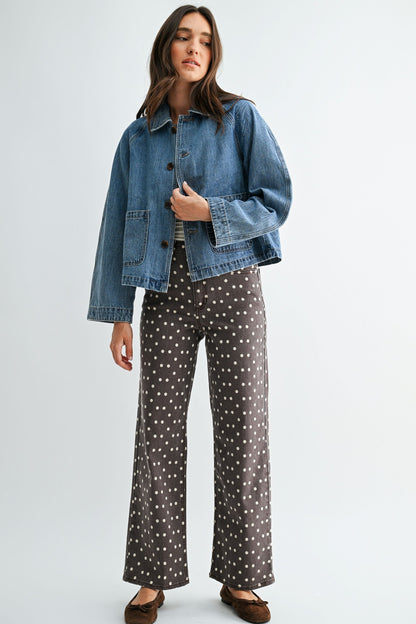 Front view medium wash denim swing jacket
