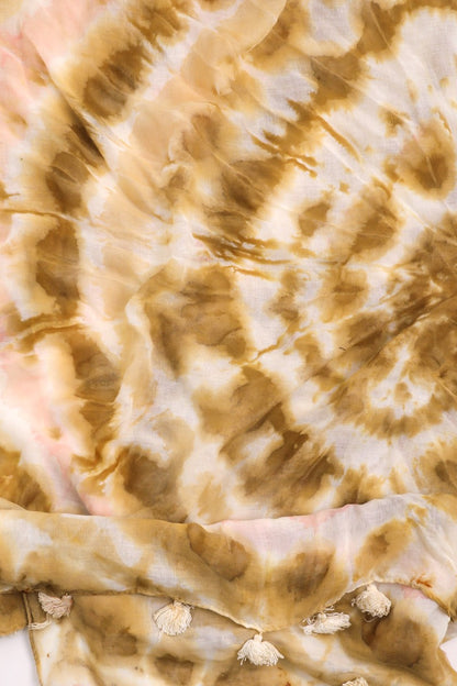 Close-up of camel and cream tie dye scarf with tassels