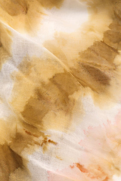 Fabric detail of camel cream and blush tie dye scarf